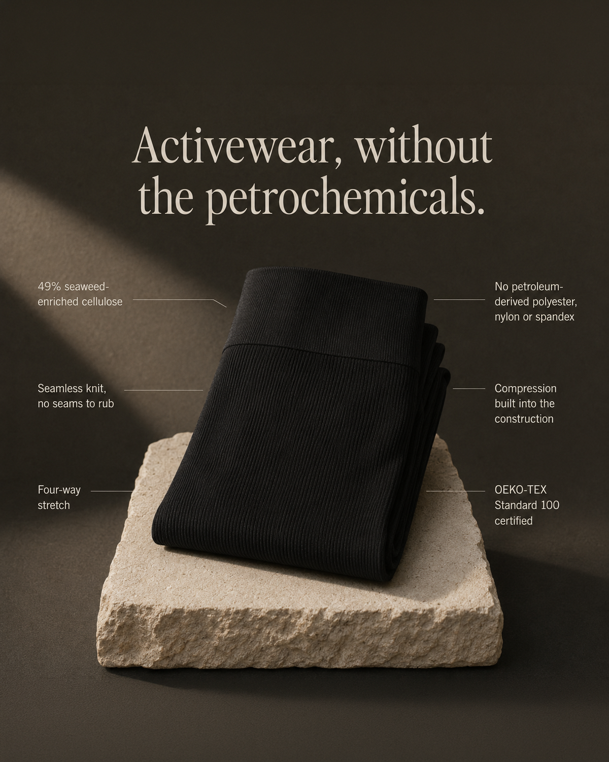 Folded nōht fabric in Black on a stone block
